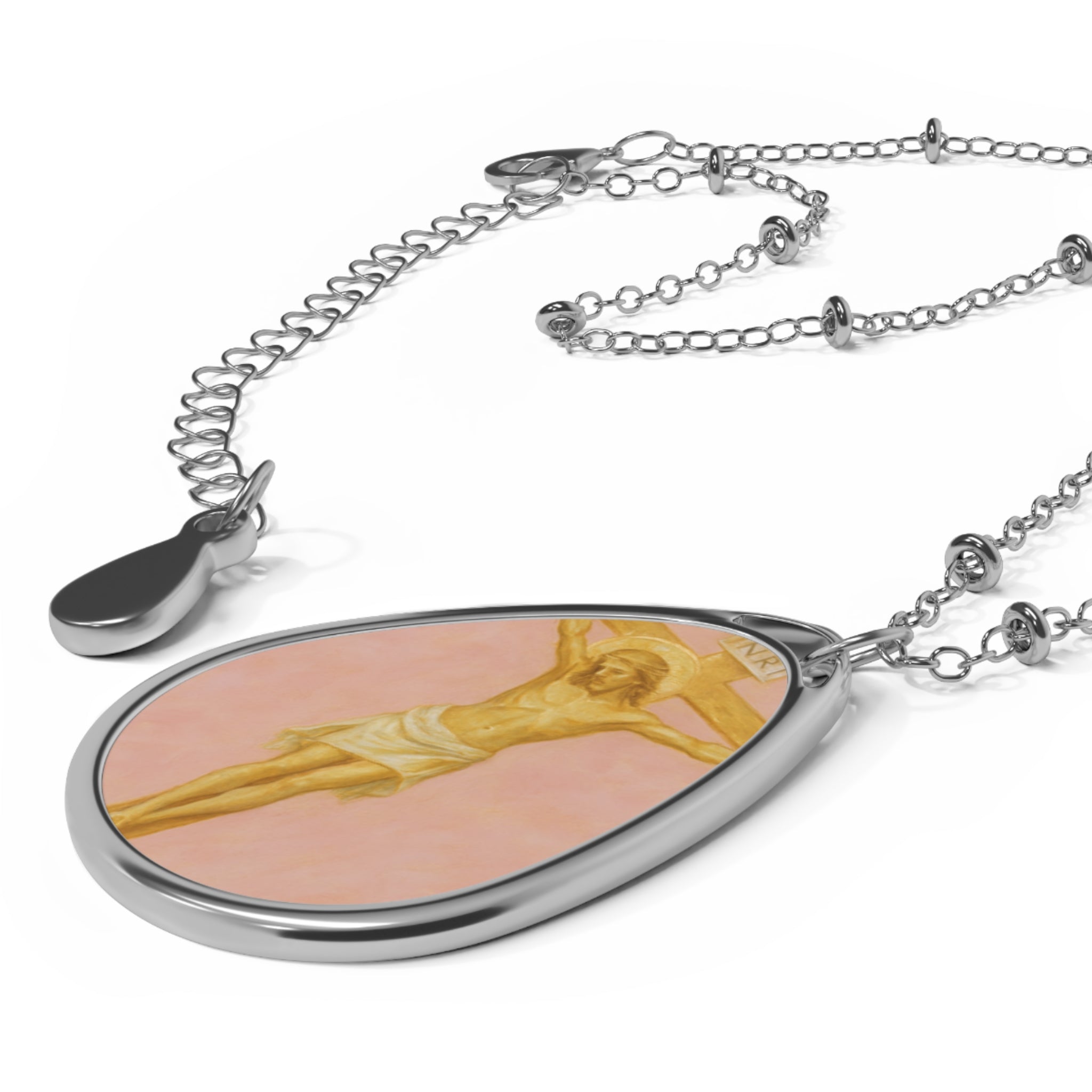 Her Holy Light Oval Pendant – Jesus on the Cross Necklace in Pastel Pink & Gold