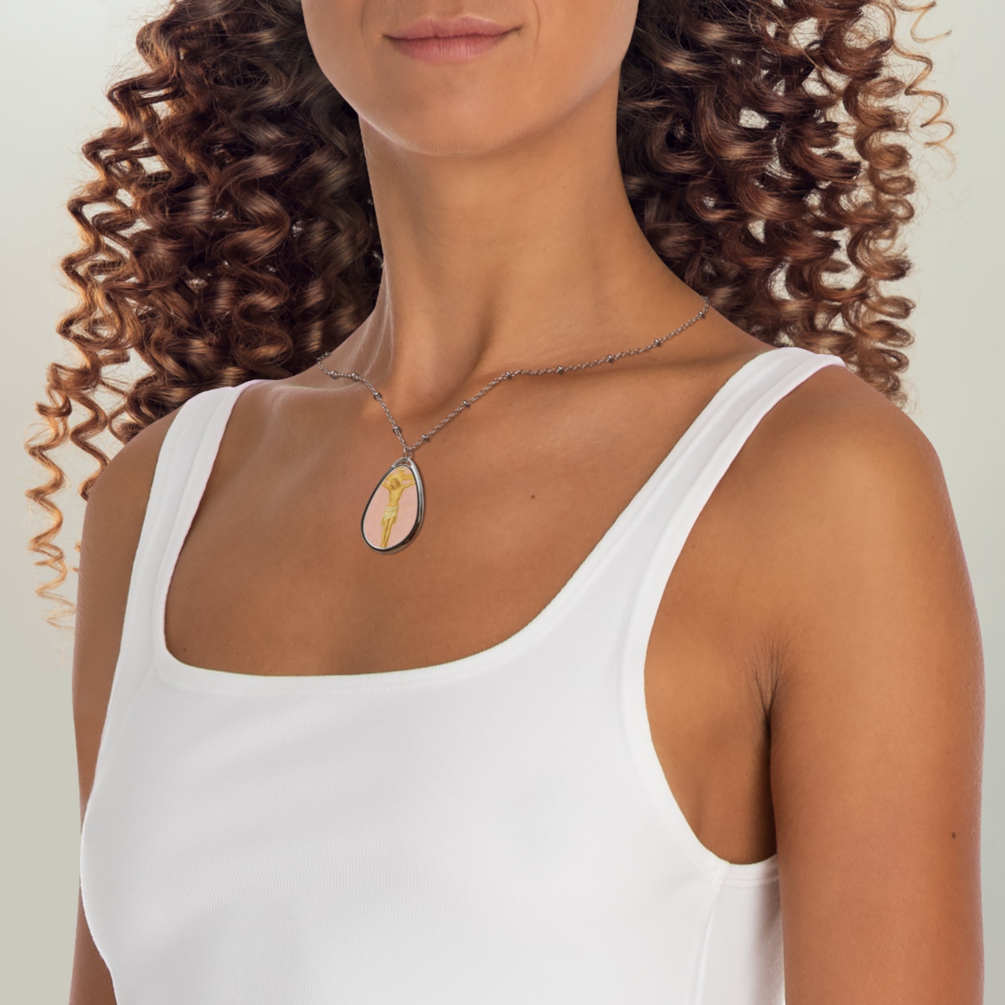 Her Holy Light Oval Pendant – Jesus on the Cross Necklace in Pastel Pink & Gold